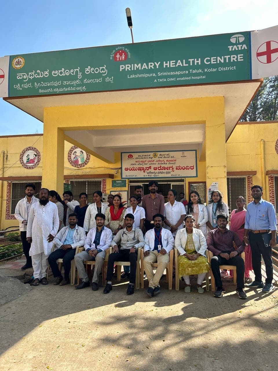 Healthcare team outside a primary health centre